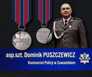 plansza z wizerunkiem policjanta oraz medalem